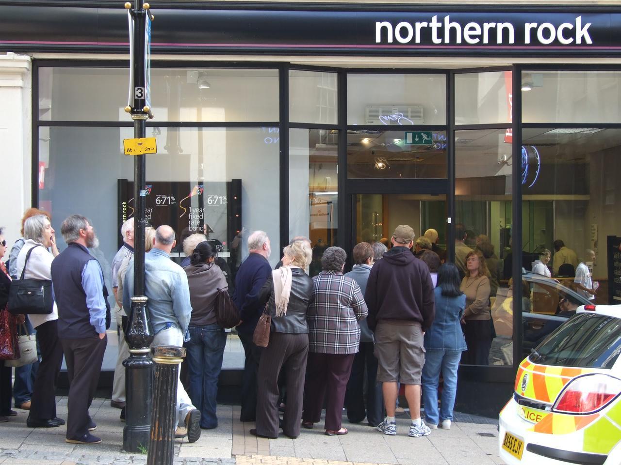 Customers queuing outside a Northern Rock branch in Birmingham during the September 2007 bank run