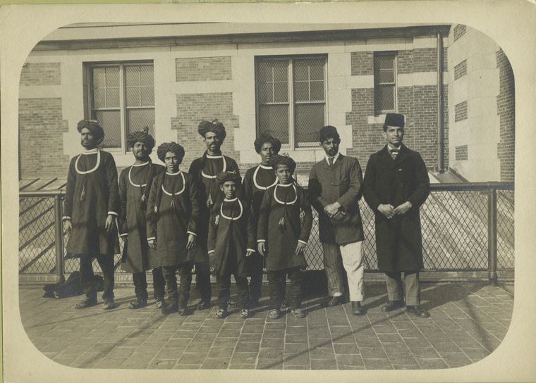 Newly arrived immigrants photographed at Ellis Island in native dress